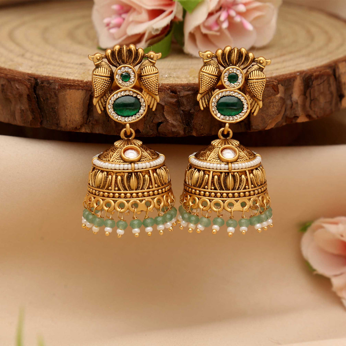 Antique Gold Peacock Jhumka Earrings with Green Stones & Pearl Drops