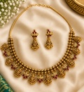 Antique Gold-Tone Lakshmi Necklace Set with Ruby Accents